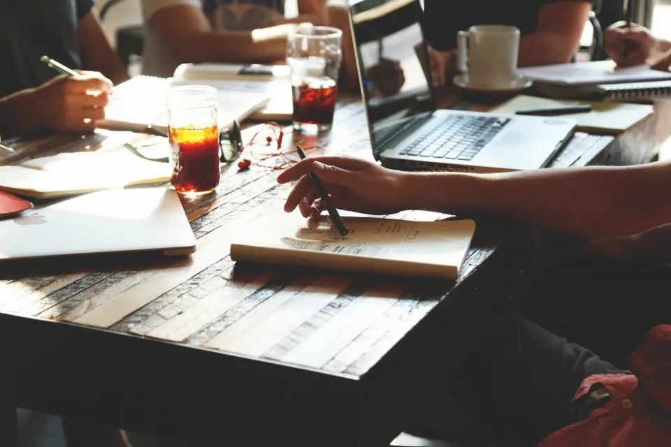 A team collaborating together around a table