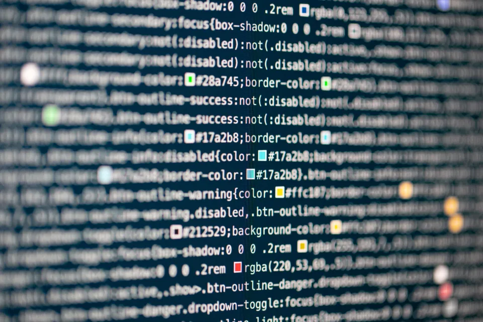 Lines of application code on a dark screen